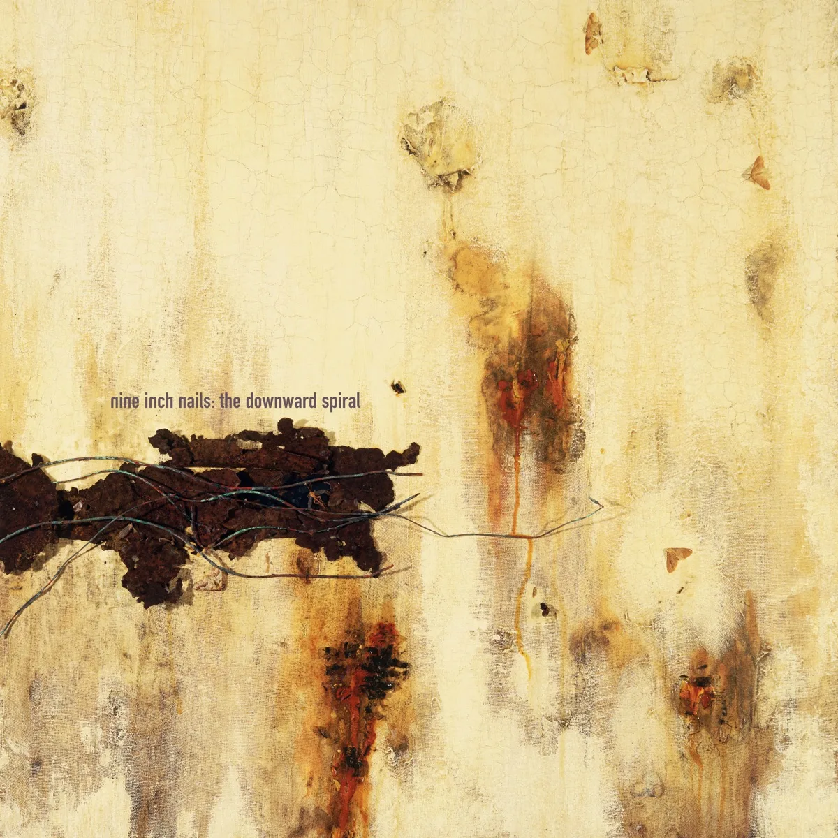 Capa do álbum The Downward Spiral, do Nine Inch Nails