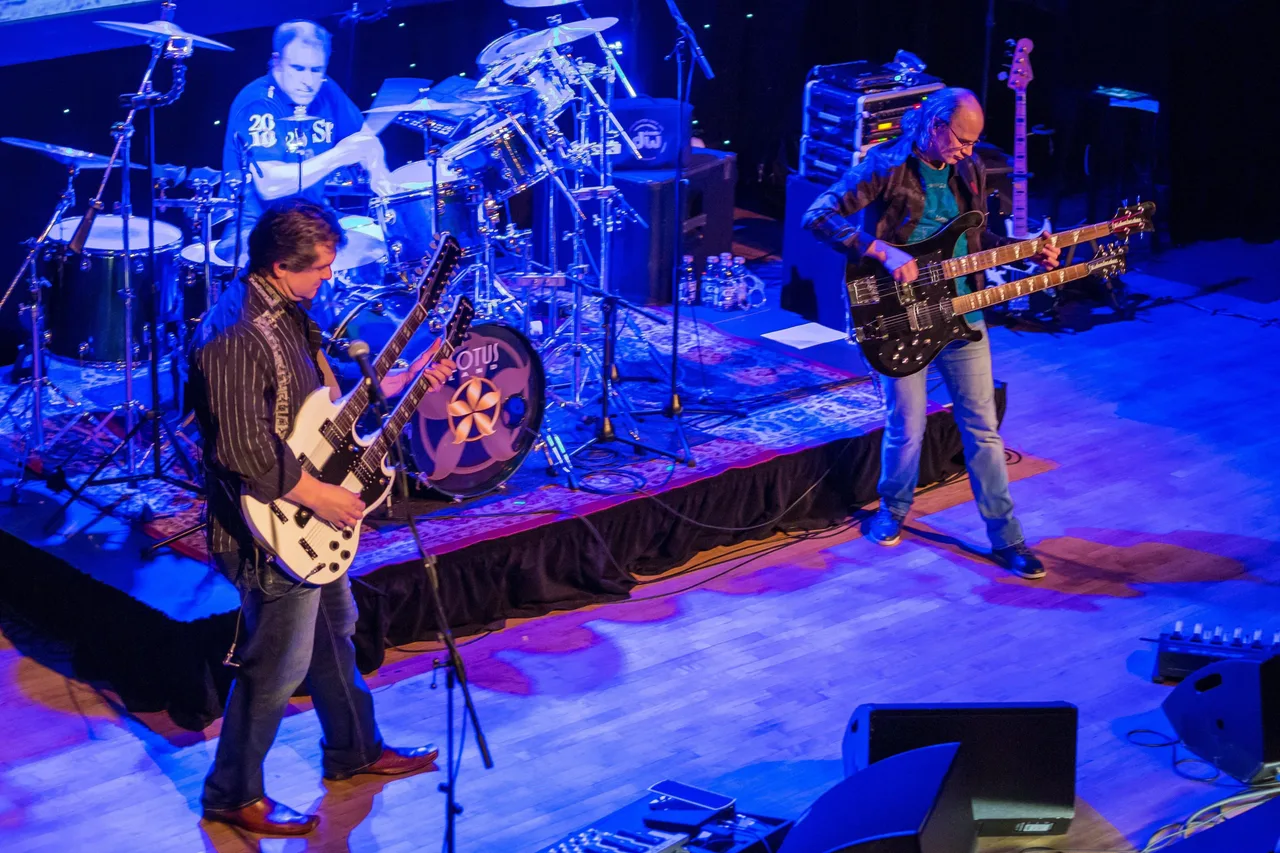 Os integrantes do Rush ao vivo